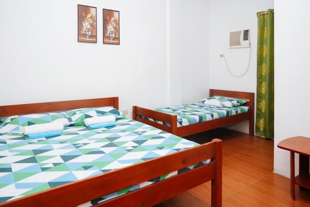 C Star Travellers Inn Oslob Bagian luar foto