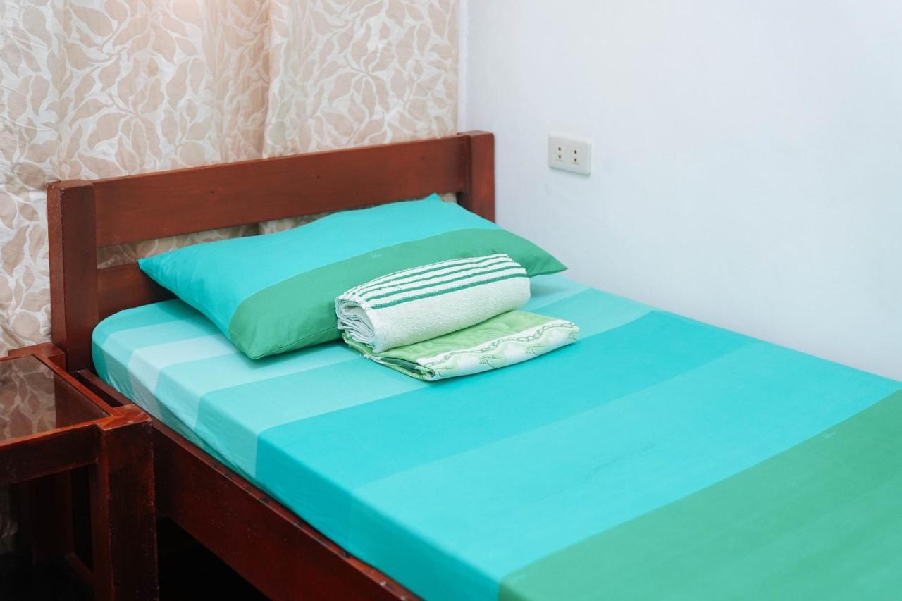 C Star Travellers Inn Oslob Bagian luar foto