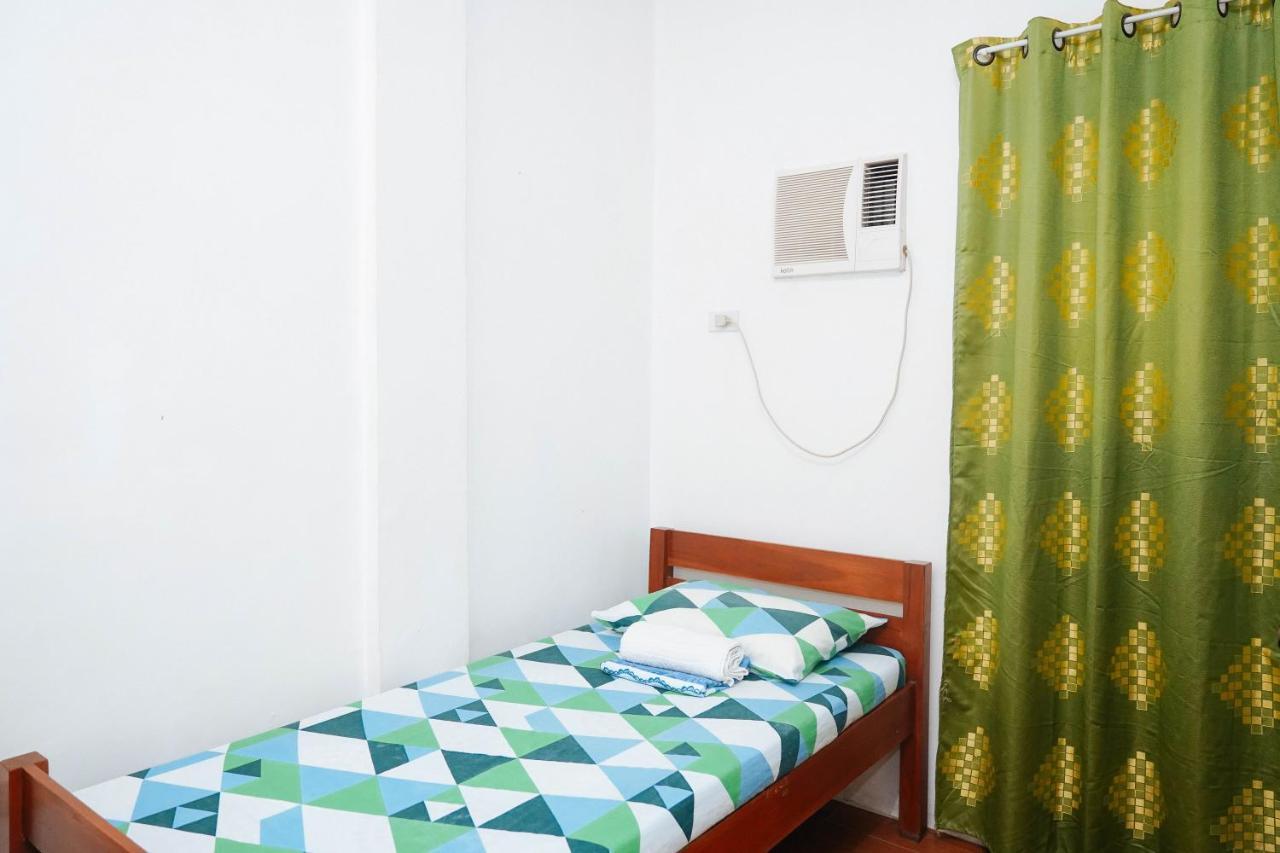 C Star Travellers Inn Oslob Bagian luar foto