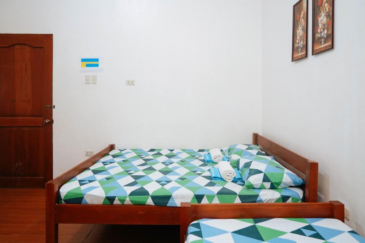 C Star Travellers Inn Oslob Bagian luar foto